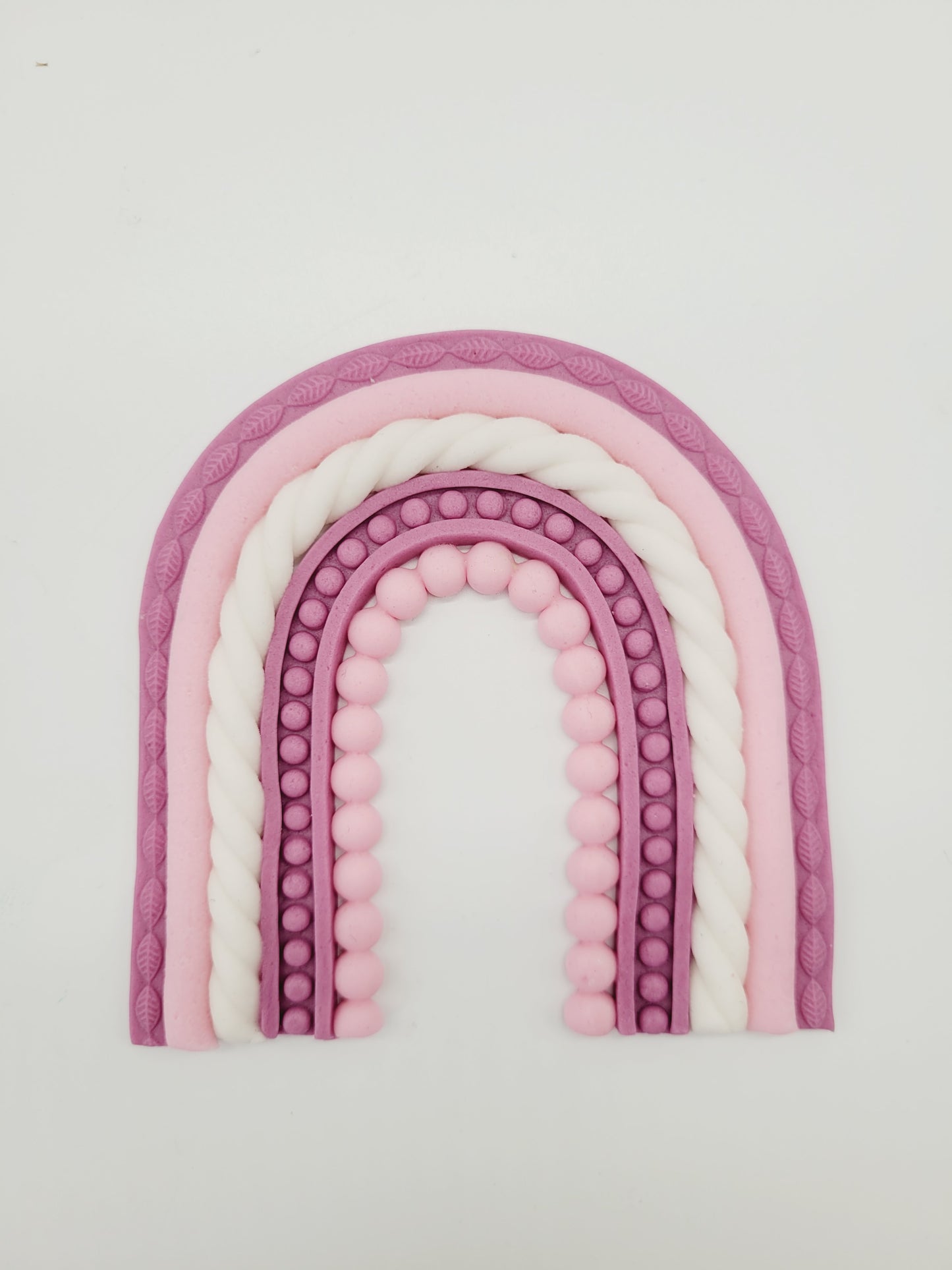 Regenbogen aus Fondant rosa pink weiß