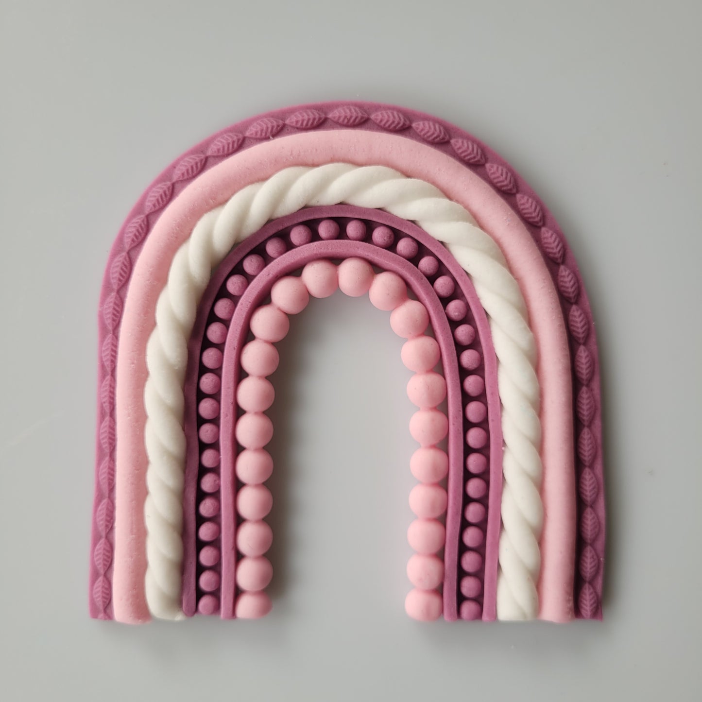 Regenbogen aus Fondant rosa pink weiß
