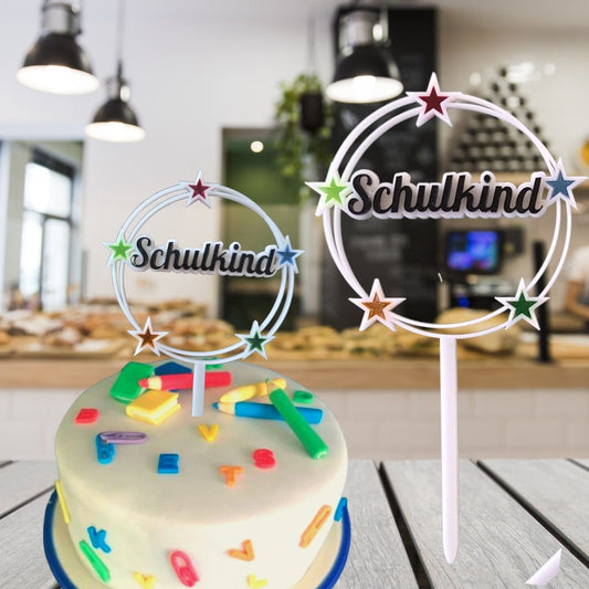 Tortenstecker Schulkind mit bunten Sternen