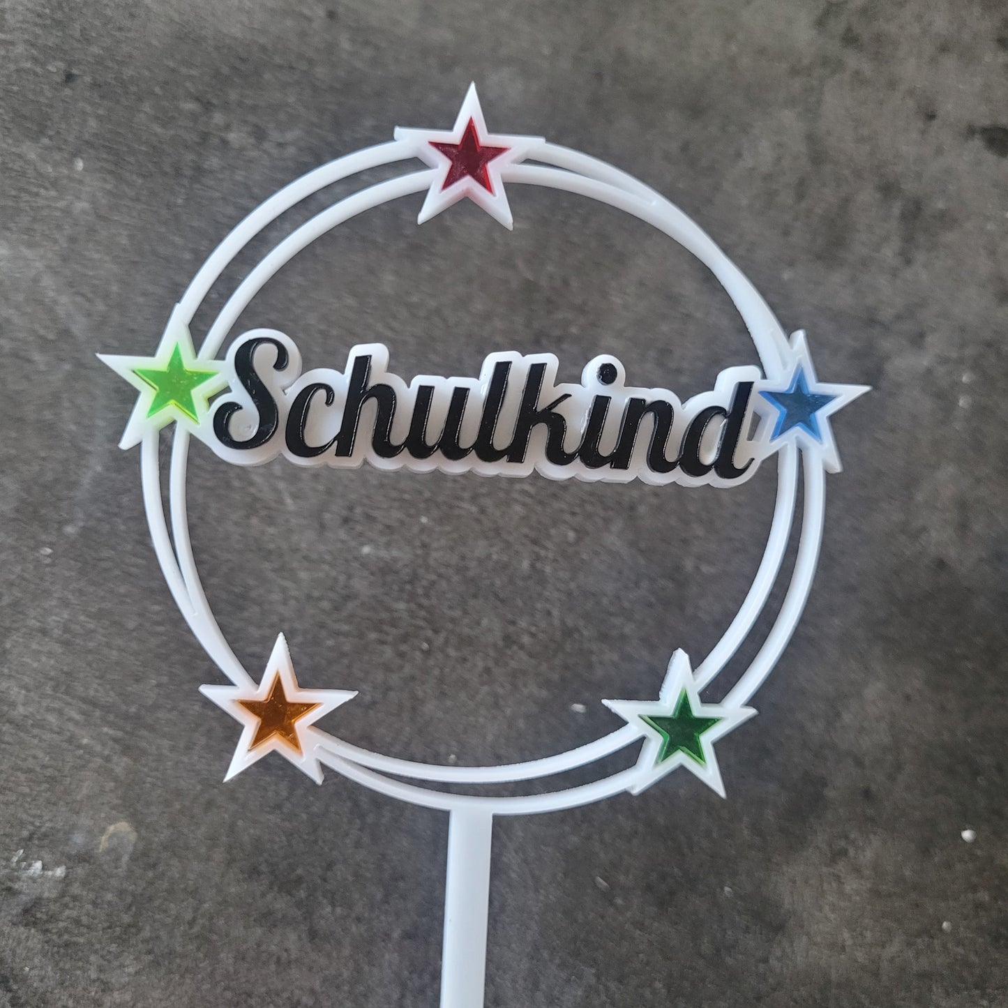Tortenstecker Schulkind mit bunten Sternen