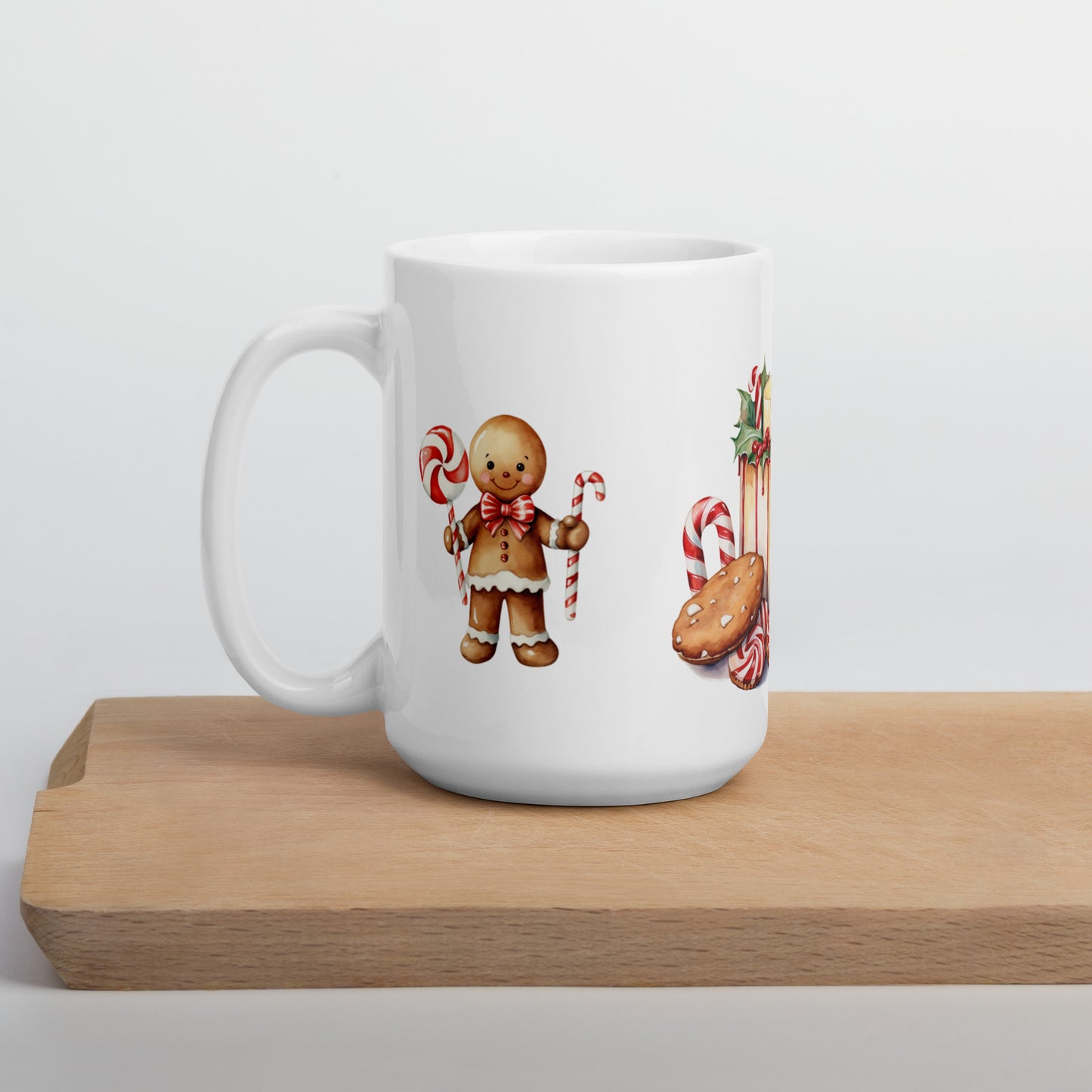 Tasse mit Kerze und Lebkuchenmännchen