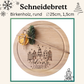 rundes schneidebrett birkenholz, Ø 25 cm, graviert mit „Adventszauber“, küchenbrett  kleine moderne häuserreihe shilouette mit baum in der mitte und herz weihnachtsgeschenk