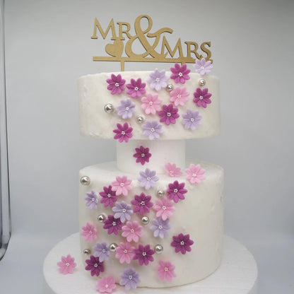 zuckerblumen rosa flieder beere blüten tortendekoration hochzeitstortendeko essbare tortendeko