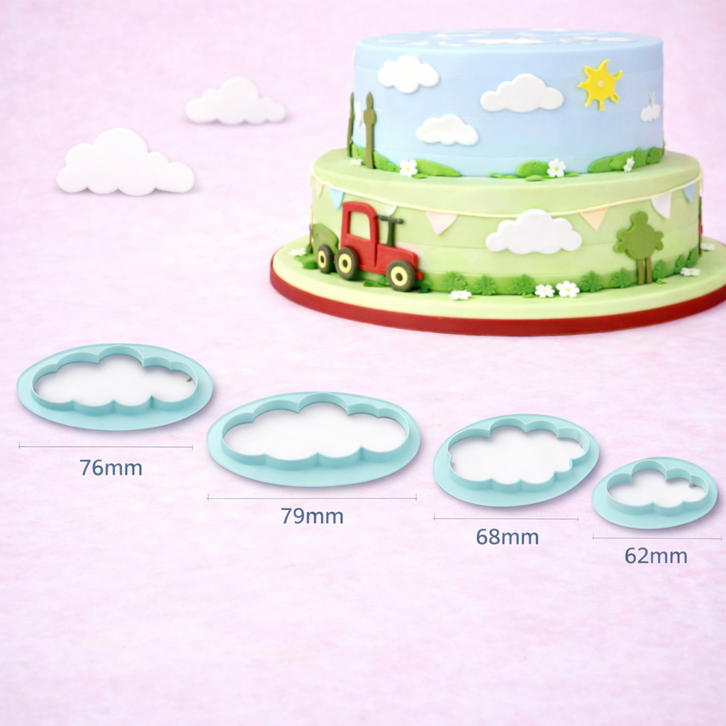 Wolken-Ausstecher Set in verschiedenen Größen für Fondant und Kekse, gezeigt vor dekorierter Torte mit Wolkenmotiv