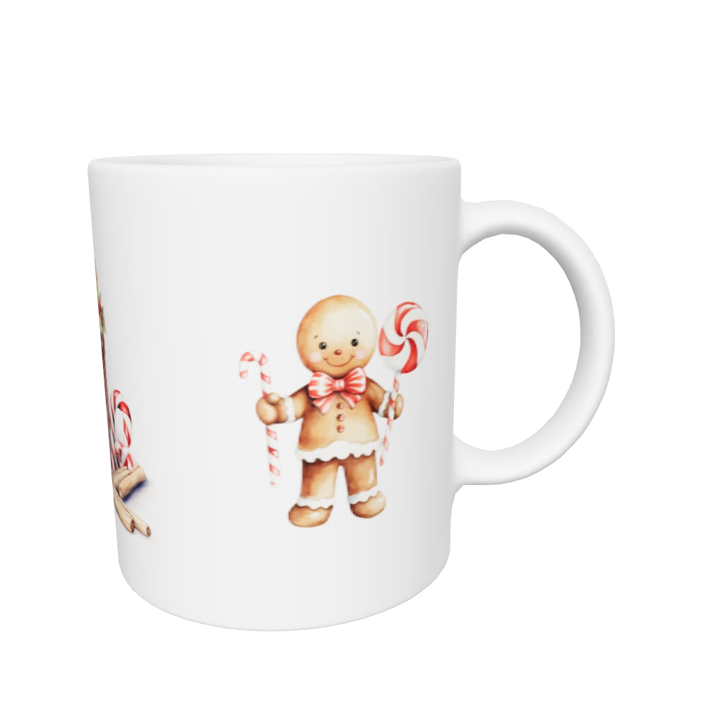 Tasse mit Kerze und Lebkuchenmännchen