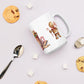 Tasse mit Kerze und Lebkuchenmännchen