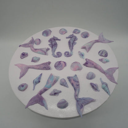 essbar-flossen-seepferdchen-muscheln-blau-lila-flieder-tortendekoration-set-fondantdekoration